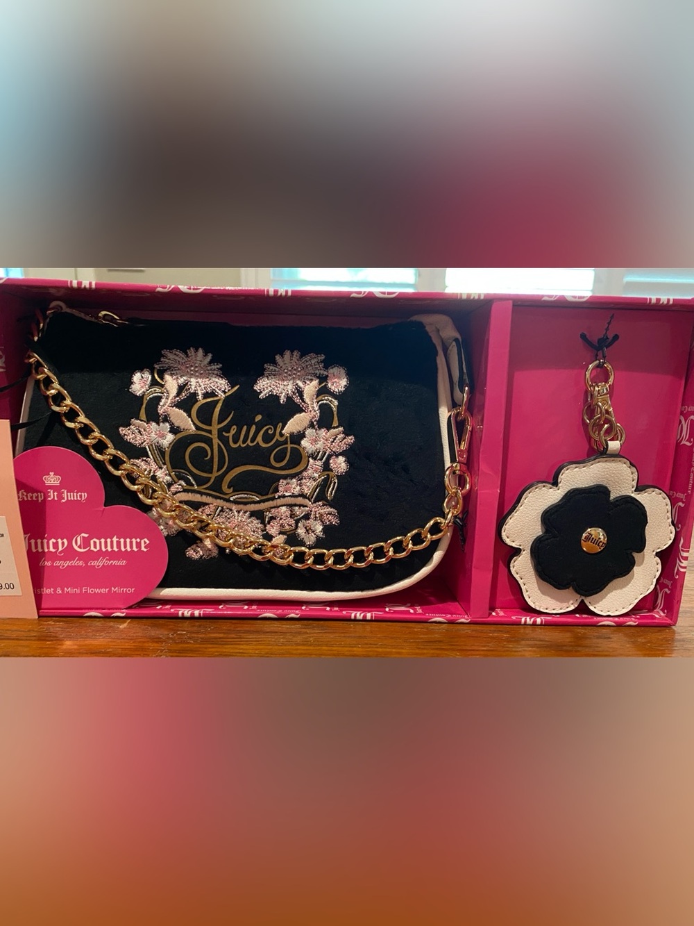 Juicy Couture Black Shouider bag with Flower keychain mirror. It’s a 2Fer! MSRP